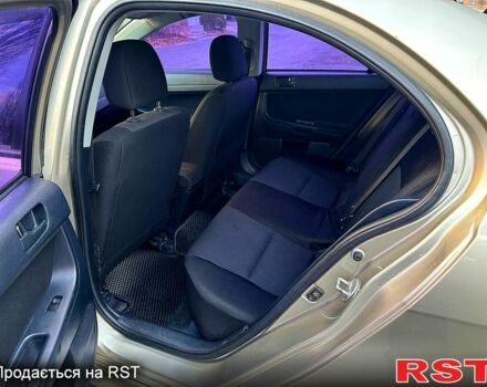 Бежевий Міцубісі Lancer, об'ємом двигуна 1.8 л та пробігом 154 тис. км за 6300 $, фото 10 на Automoto.ua