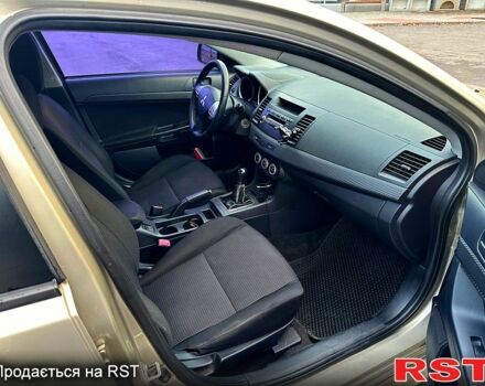 Бежевий Міцубісі Lancer, об'ємом двигуна 1.8 л та пробігом 154 тис. км за 6300 $, фото 7 на Automoto.ua