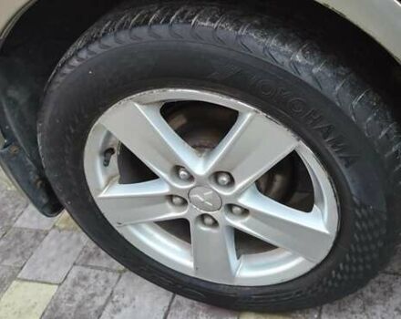 Бежевий Міцубісі Lancer, об'ємом двигуна 1.8 л та пробігом 204 тис. км за 7300 $, фото 15 на Automoto.ua