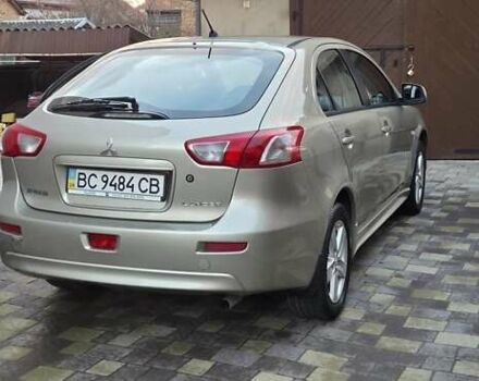 Бежевий Міцубісі Lancer, об'ємом двигуна 1.8 л та пробігом 204 тис. км за 7500 $, фото 1 на Automoto.ua