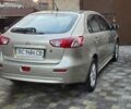 Бежевий Міцубісі Lancer, об'ємом двигуна 1.8 л та пробігом 204 тис. км за 7500 $, фото 1 на Automoto.ua
