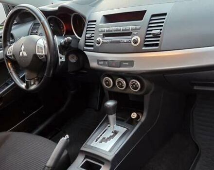 Бежевий Міцубісі Lancer, об'ємом двигуна 1.8 л та пробігом 204 тис. км за 7300 $, фото 9 на Automoto.ua