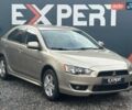 Бежевий Міцубісі Lancer, об'ємом двигуна 1.8 л та пробігом 203 тис. км за 7190 $, фото 1 на Automoto.ua