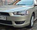 Бежевий Міцубісі Lancer, об'ємом двигуна 1.8 л та пробігом 204 тис. км за 7500 $, фото 1 на Automoto.ua