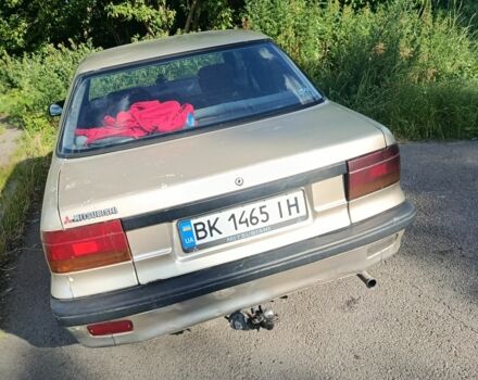 Бежевий Міцубісі Lancer, об'ємом двигуна 1.8 л та пробігом 380 тис. км за 1300 $, фото 4 на Automoto.ua