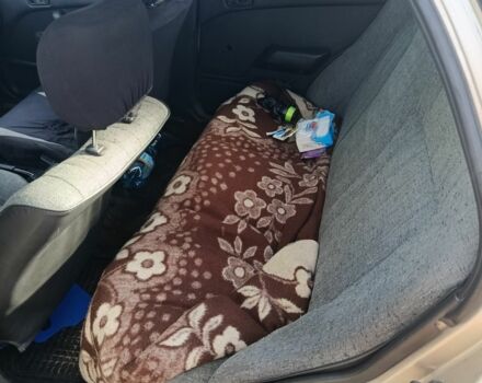 Бежевый Мицубиси Лансер, объемом двигателя 1.8 л и пробегом 380 тыс. км за 1000 $, фото 3 на Automoto.ua