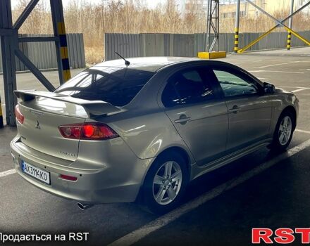 Бежевый Мицубиси Лансер, объемом двигателя 2 л и пробегом 190 тыс. км за 6350 $, фото 2 на Automoto.ua