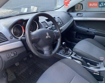 Бежевый Мицубиси Лансер, объемом двигателя 1.5 л и пробегом 242 тыс. км за 5999 $, фото 16 на Automoto.ua