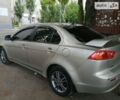 Бежевий Міцубісі Lancer, об'ємом двигуна 1.5 л та пробігом 185 тис. км за 6550 $, фото 15 на Automoto.ua