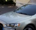 Бежевий Міцубісі Lancer, об'ємом двигуна 2 л та пробігом 220 тис. км за 7900 $, фото 2 на Automoto.ua