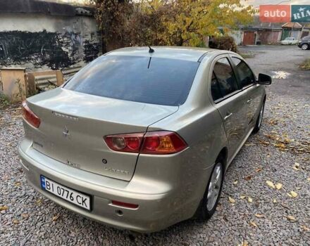 Бежевый Мицубиси Лансер, объемом двигателя 1.5 л и пробегом 242 тыс. км за 5999 $, фото 2 на Automoto.ua