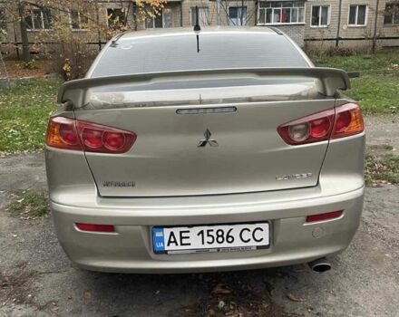 Бежевий Міцубісі Lancer, об'ємом двигуна 2 л та пробігом 290 тис. км за 6000 $, фото 3 на Automoto.ua
