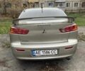 Бежевий Міцубісі Lancer, об'ємом двигуна 2 л та пробігом 290 тис. км за 6000 $, фото 3 на Automoto.ua