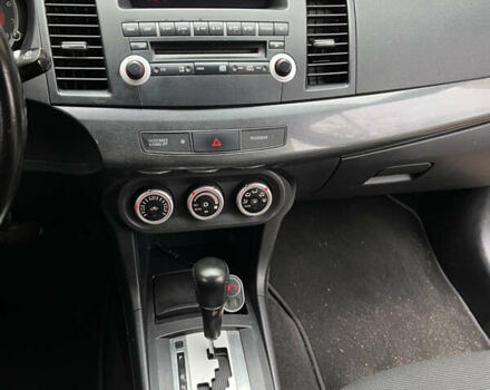 Бежевий Міцубісі Lancer, об'ємом двигуна 2 л та пробігом 240 тис. км за 6300 $, фото 10 на Automoto.ua