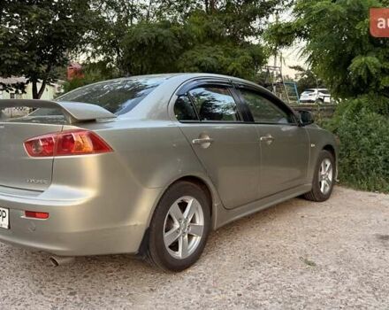 Бежевий Міцубісі Lancer, об'ємом двигуна 2 л та пробігом 132 тис. км за 7500 $, фото 7 на Automoto.ua