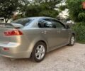 Бежевий Міцубісі Lancer, об'ємом двигуна 2 л та пробігом 132 тис. км за 7500 $, фото 7 на Automoto.ua