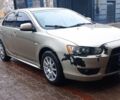 Бежевий Міцубісі Lancer, об'ємом двигуна 2 л та пробігом 200 тис. км за 6500 $, фото 1 на Automoto.ua