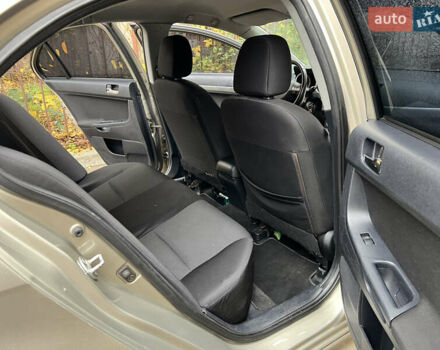 Бежевий Міцубісі Lancer, об'ємом двигуна 2 л та пробігом 240 тис. км за 6300 $, фото 5 на Automoto.ua