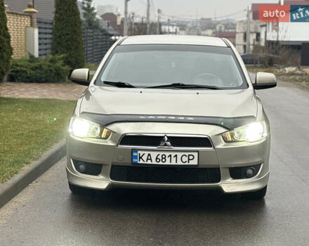 Бежевый Мицубиси Лансер, объемом двигателя 2 л и пробегом 250 тыс. км за 6400 $, фото 4 на Automoto.ua