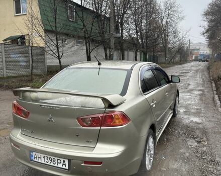 Бежевый Мицубиси Лансер, объемом двигателя 2 л и пробегом 270 тыс. км за 4950 $, фото 2 на Automoto.ua