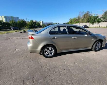 Бежевий Міцубісі Lancer, об'ємом двигуна 2 л та пробігом 180 тис. км за 6500 $, фото 1 на Automoto.ua