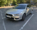 Бежевий Міцубісі Lancer, об'ємом двигуна 1.5 л та пробігом 225 тис. км за 5700 $, фото 1 на Automoto.ua