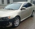 Бежевий Міцубісі Lancer, об'ємом двигуна 2 л та пробігом 200 тис. км за 6500 $, фото 3 на Automoto.ua