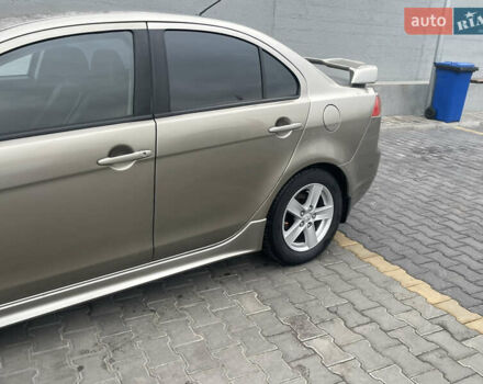 Бежевый Мицубиси Лансер, объемом двигателя 2 л и пробегом 230 тыс. км за 5599 $, фото 1 на Automoto.ua