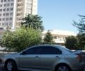 Бежевий Міцубісі Lancer, об'ємом двигуна 2 л та пробігом 220 тис. км за 7900 $, фото 4 на Automoto.ua