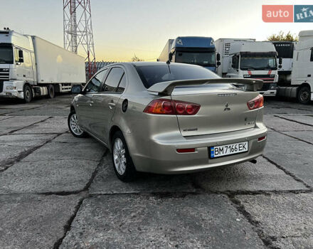 Бежевий Міцубісі Lancer, об'ємом двигуна 1.5 л та пробігом 206 тис. км за 5989 $, фото 4 на Automoto.ua