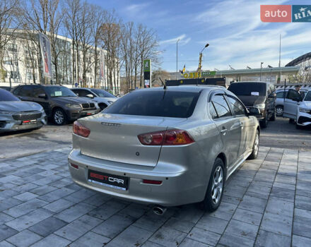 Бежевий Міцубісі Lancer, об'ємом двигуна 2 л та пробігом 250 тис. км за 8400 $, фото 9 на Automoto.ua