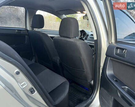 Бежевий Міцубісі Lancer, об'ємом двигуна 1.5 л та пробігом 206 тис. км за 5989 $, фото 8 на Automoto.ua
