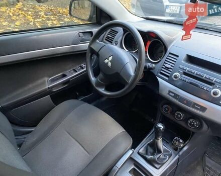 Бежевый Мицубиси Лансер, объемом двигателя 1.5 л и пробегом 242 тыс. км за 5999 $, фото 15 на Automoto.ua