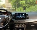 Бежевий Міцубісі Lancer, об'ємом двигуна 2 л та пробігом 132 тис. км за 7500 $, фото 14 на Automoto.ua