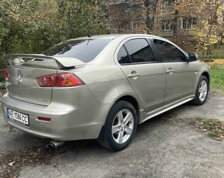 Бежевий Міцубісі Lancer, об'ємом двигуна 2 л та пробігом 290 тис. км за 6000 $, фото 1 на Automoto.ua
