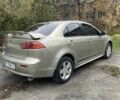 Бежевий Міцубісі Lancer, об'ємом двигуна 2 л та пробігом 290 тис. км за 6000 $, фото 1 на Automoto.ua
