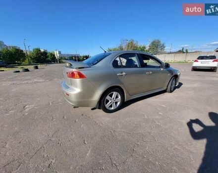 Бежевий Міцубісі Lancer, об'ємом двигуна 2 л та пробігом 180 тис. км за 6500 $, фото 6 на Automoto.ua