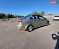 Бежевий Міцубісі Lancer, об'ємом двигуна 2 л та пробігом 180 тис. км за 6500 $, фото 6 на Automoto.ua