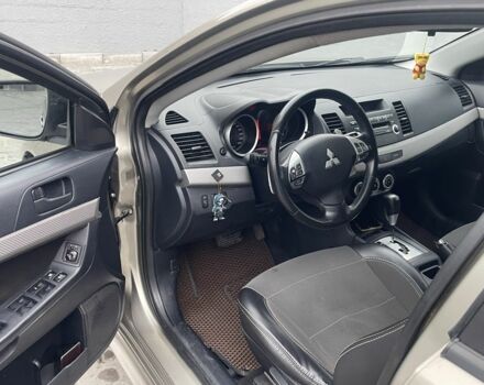 Бежевый Мицубиси Лансер, объемом двигателя 2 л и пробегом 230 тыс. км за 5799 $, фото 4 на Automoto.ua