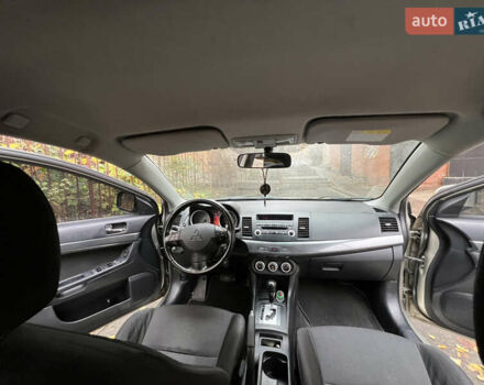 Бежевий Міцубісі Lancer, об'ємом двигуна 2 л та пробігом 240 тис. км за 6300 $, фото 6 на Automoto.ua