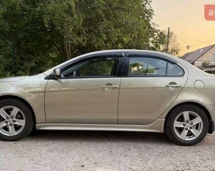 Бежевий Міцубісі Lancer, об'ємом двигуна 2 л та пробігом 132 тис. км за 7500 $, фото 4 на Automoto.ua