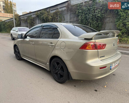 Бежевый Мицубиси Лансер, объемом двигателя 2 л и пробегом 238 тыс. км за 5500 $, фото 4 на Automoto.ua