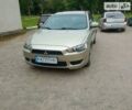 Бежевий Міцубісі Lancer, об'ємом двигуна 1.5 л та пробігом 232 тис. км за 4999 $, фото 16 на Automoto.ua