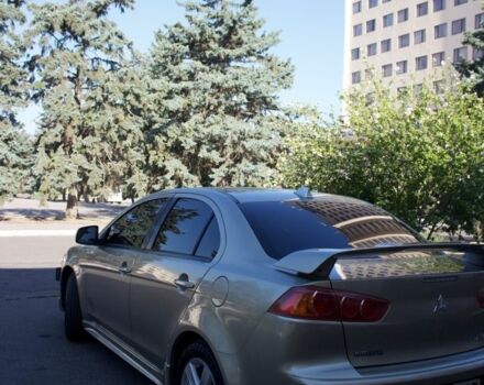 Бежевий Міцубісі Lancer, об'ємом двигуна 2 л та пробігом 220 тис. км за 7900 $, фото 6 на Automoto.ua