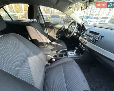 Бежевий Міцубісі Lancer, об'ємом двигуна 2 л та пробігом 250 тис. км за 8400 $, фото 28 на Automoto.ua