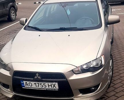 Бежевий Міцубісі Lancer, об'ємом двигуна 2 л та пробігом 114 тис. км за 6500 $, фото 3 на Automoto.ua