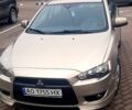 Бежевий Міцубісі Lancer, об'ємом двигуна 2 л та пробігом 114 тис. км за 6500 $, фото 3 на Automoto.ua