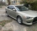 Бежевий Міцубісі Lancer, об'ємом двигуна 2 л та пробігом 290 тис. км за 6000 $, фото 1 на Automoto.ua