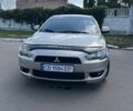 Бежевый Мицубиси Лансер, объемом двигателя 2 л и пробегом 300 тыс. км за 5400 $, фото 1 на Automoto.ua