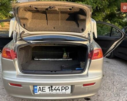 Бежевий Міцубісі Lancer, об'ємом двигуна 2 л та пробігом 132 тис. км за 7500 $, фото 21 на Automoto.ua